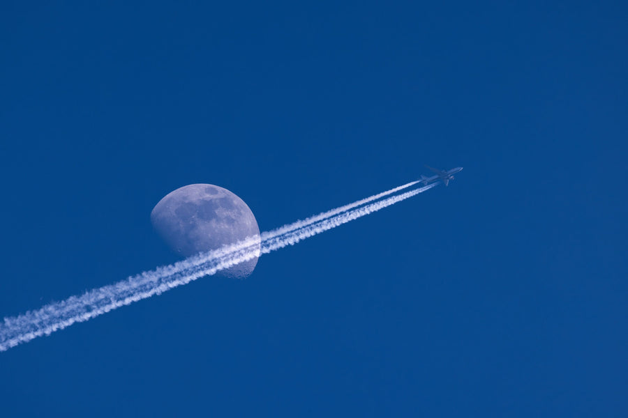 Airplane Trails and Moon Mural Wallpaper