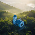 Mist-Covered Mountain Chapel Mural Wallpaper — Aerial Landscape Mural Wallpaper - room preview 02