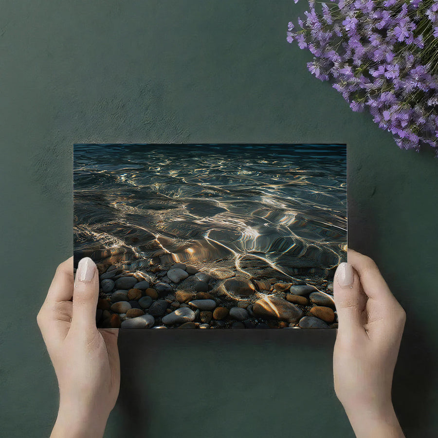 Coastal Wallpaper Mural – Seaside Wall Mural – Sunlit Pebble Shore — Calm Coastal Shoreline